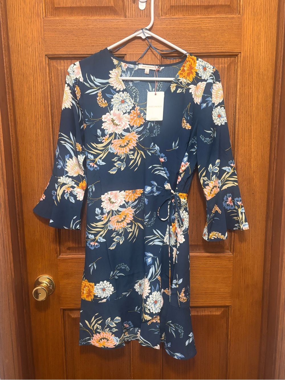 Skies Are Blue Navy Floral Wrap Midi Dress with Peach & White Blooms